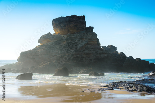 Rocks in the Atlantic Ocean near Praia do Castelejo-fantastic beach on the southwest coast of Portugal. Region Algarve