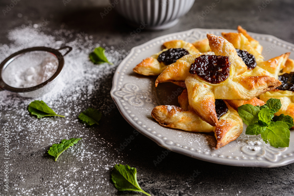 Homemade Danish pastry with vanilla pudding and plum jam