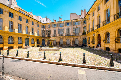 Albertas square with beautiful old fountain in Aix-en-Provence old town in France. French architecture in Provence photo