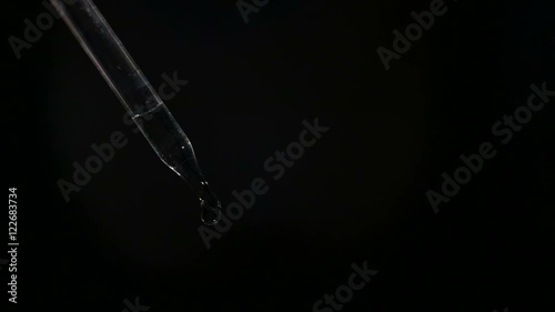 Mixing liquid for vaping using pipette closeup photo