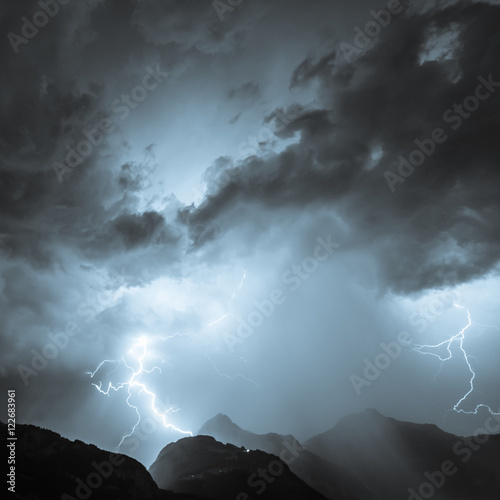 Lightning over the mountains, thunderbolt.