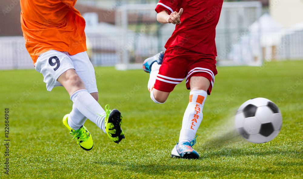 Soccer kick. Player kicking soccer ball