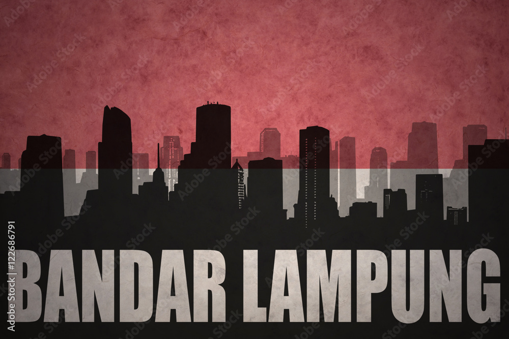 abstract silhouette of the city with text Bandar Lampung at the vintage indonesian flag background