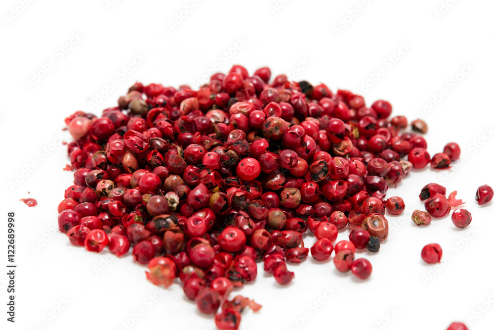 Dry pea pink pepper on a white background Dry pea pink pepper on a white background