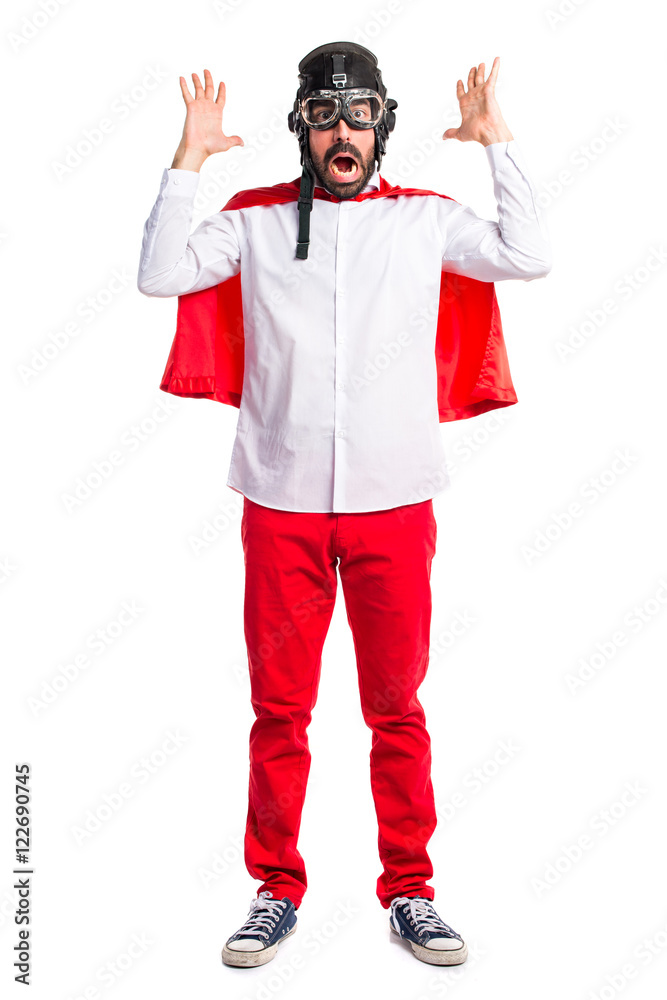 Crazy superhero man doing surprise gesture Crazy superhero man doing surprise gesture