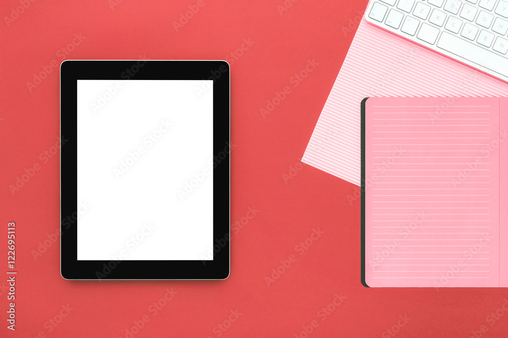 Blank tablet with keyboard and notebook on color background. Min Blank tablet with keyboard and notebook on color background. Min