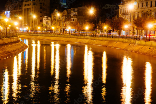Lights on Dambovita River, Bucharest, Romania photo