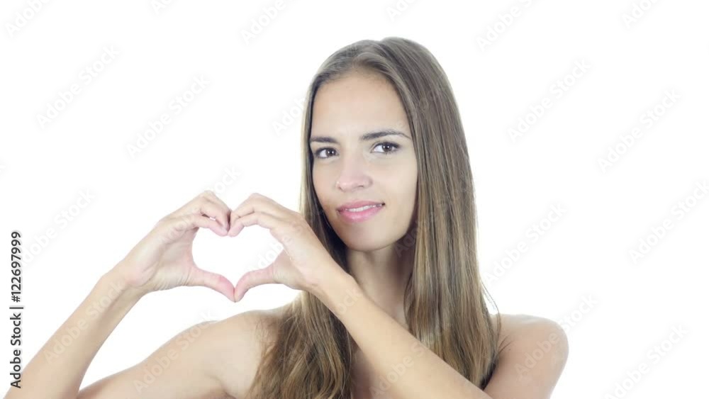 Handmade Heart Sign by Young Woman, White Background Handmade Heart Sign by Young Woman, White Background