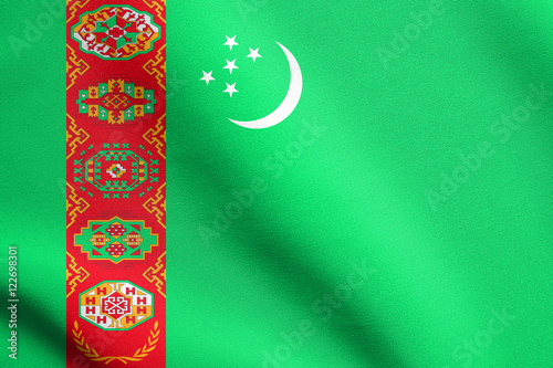 Flag of Turkmenistan waving with fabric texture