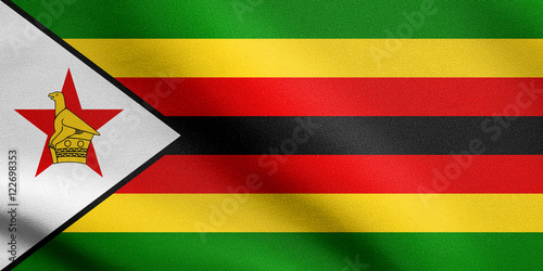 Flag of Zimbabwe waving with fabric texture