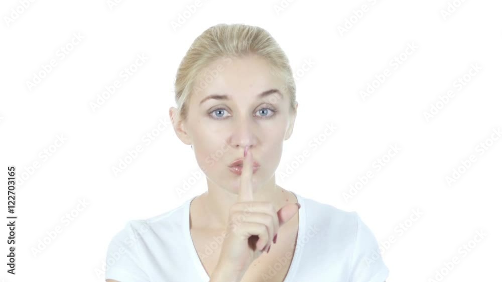 Young Girl Showing Gesture of Silence Young Girl Showing Gesture of Silence