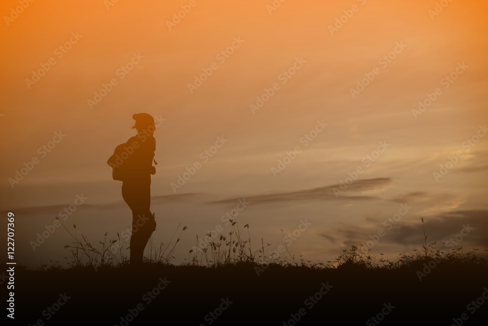 woman travelling in nature with backpack