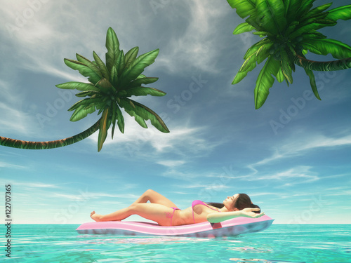 Happy woman on pink air bed