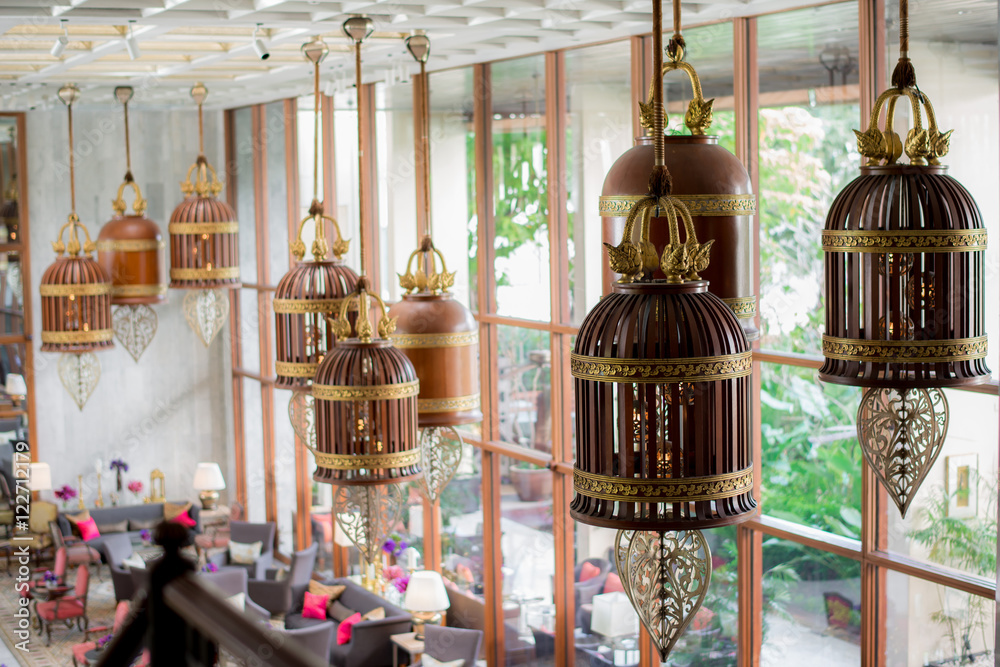 Obraz premium Giant wooden bell hanging on the ceiling.