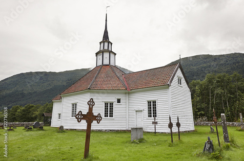 Traditional norwegian white wooden church. Stordal village. Trav photo