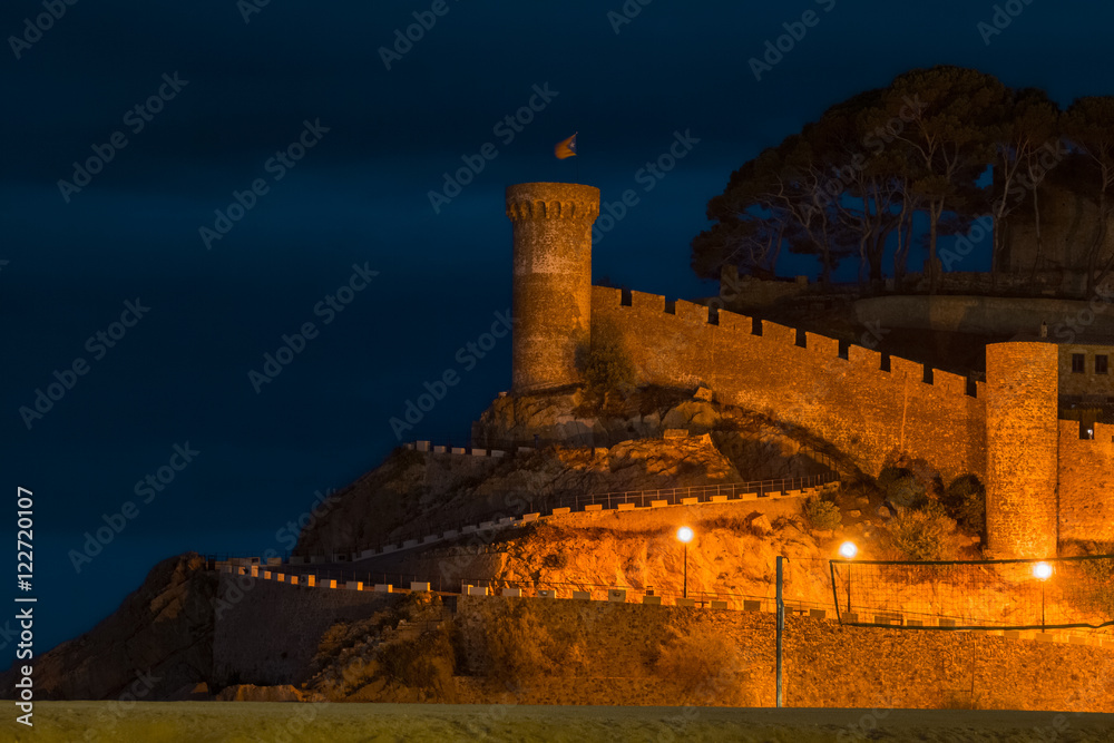 View of the tower in the town of Tossa de Mar at night, Spain