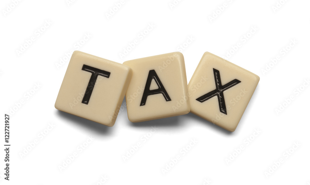Tax spelled out with lettered tiles on white background. Clipping path included. Tax spelled out with lettered tiles on white background. Clipping path included.