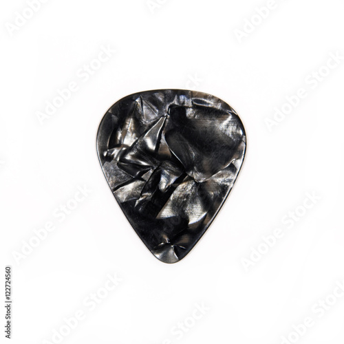 Guitar plectrum isolated on a white background