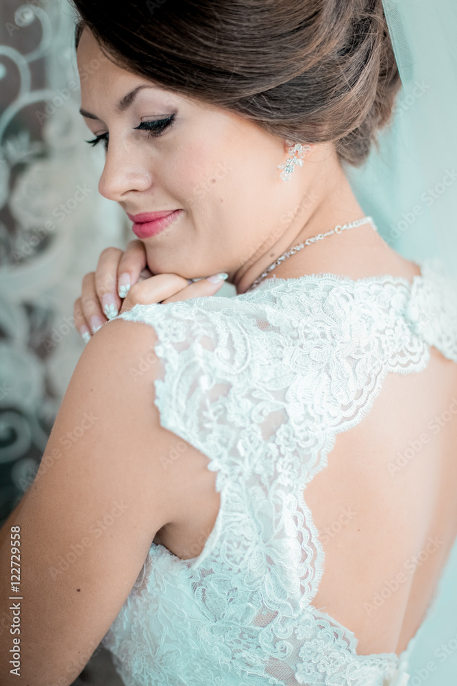 Bride looks out of the window,wedding day Bride looks out of the window,wedding day