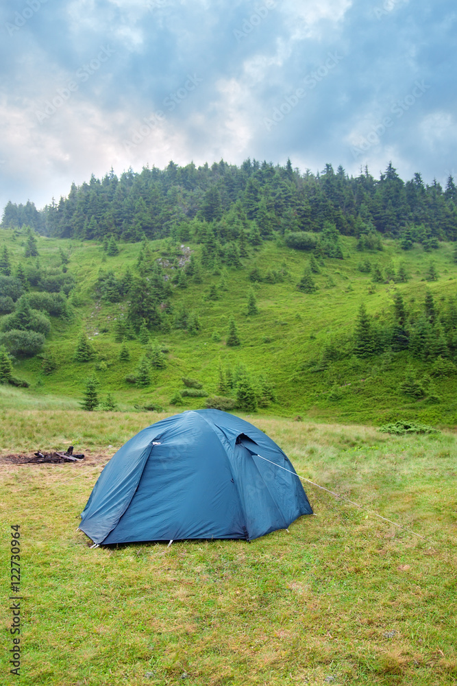 Tourist tent in mountains