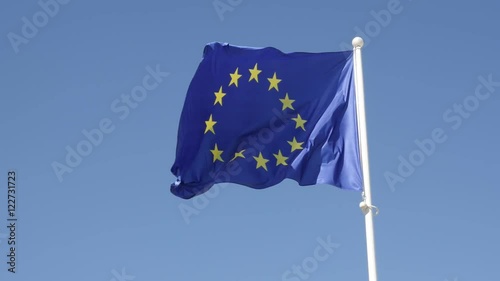 European Union recognizable symbol on pole in slow-mo 1920X1080 HD footage - Slow motion of EU flag fabric on the wind waving 1080p FullHD video  photo