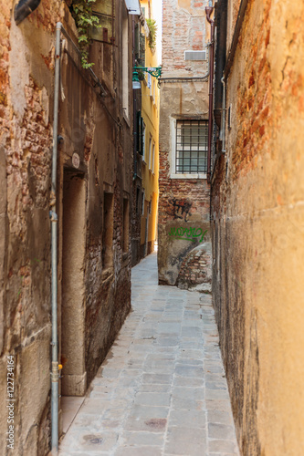 Narrow street in the old town in Italy © arbalest