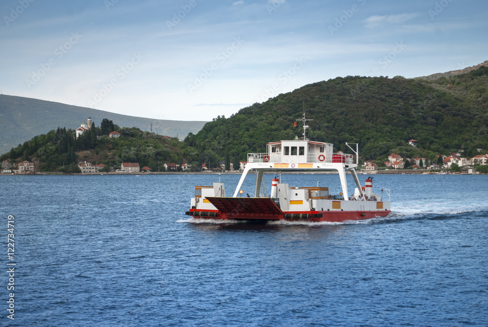 Car ferry in a picturesque bay, Montenegro. Car ferry in a picturesque bay, Montenegro.
