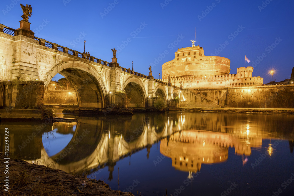 Dusk on the ancient palace of Castel Sant'Angelo with statues of angels on the bridge on Tiber RIver, Rome, Lazio Dusk on the ancient palace of Castel Sant'Angelo with statues of angels on the bridge on Tiber RIver, Rome, Lazio