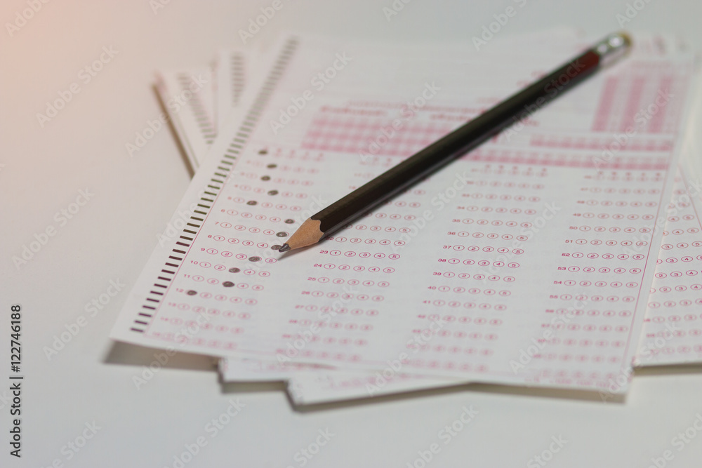 answer sheet, test score sheet with pencil on test paper answers Stock