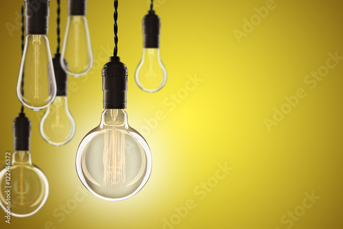 Idea and leadership concept Vintage incandescent Edison bulbs on