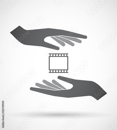 Isolated pair of hands protecting or giving   a photographic 35m photo