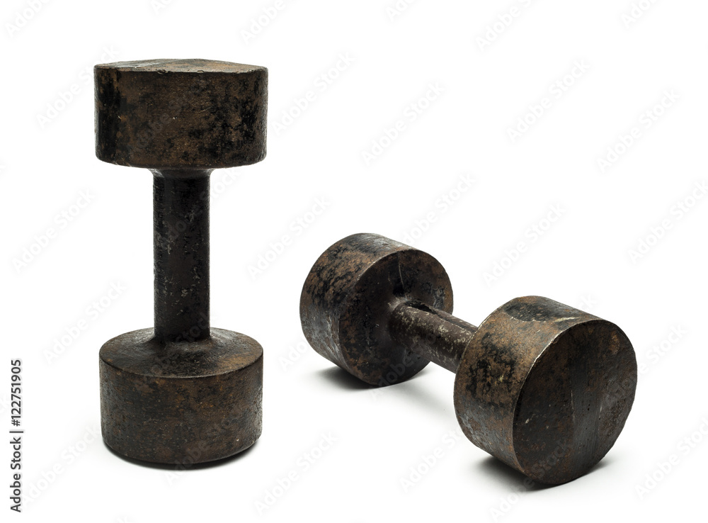 old dumbbell on a white background old dumbbell on a white background