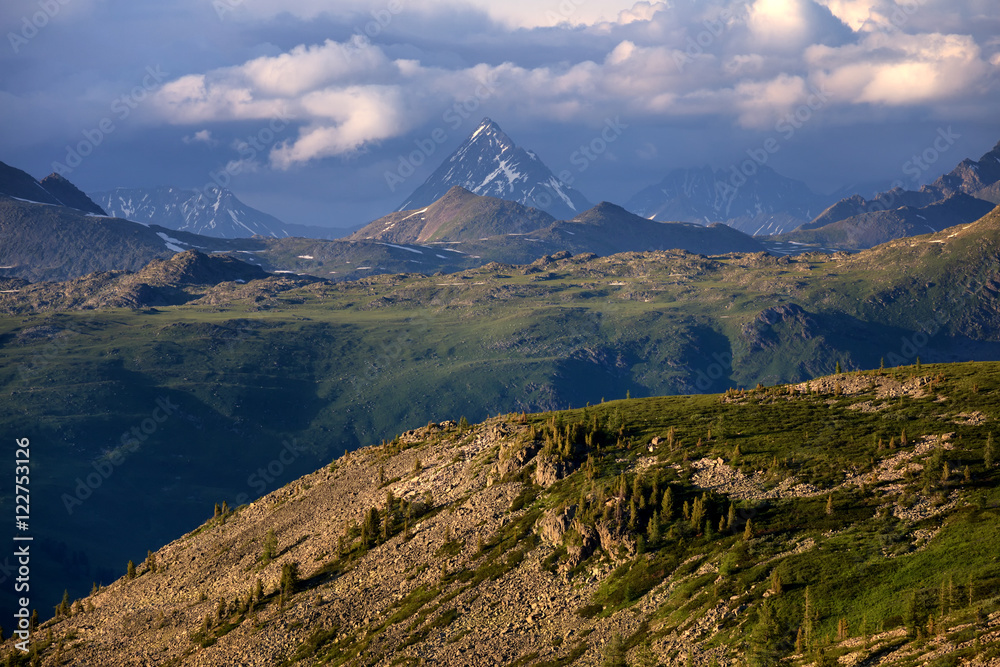Peak Urusvati at sunset, Altai mountains, Central Asia. View from Kazakhstan side at sunset. Peak Urusvati at sunset, Altai mountains, Central Asia. View from Kazakhstan side at sunset.