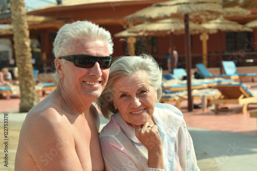 Senior couple near pool © aletia2011