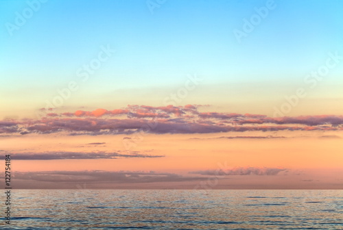 Sunset sky over smooth baltic sea