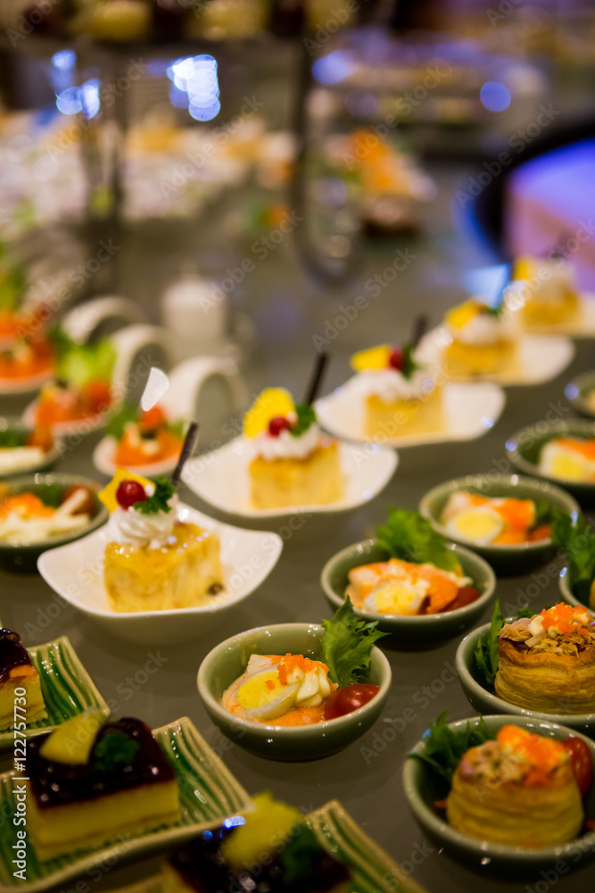 Close-up view of dessert buffet with delicious sweet bakery and