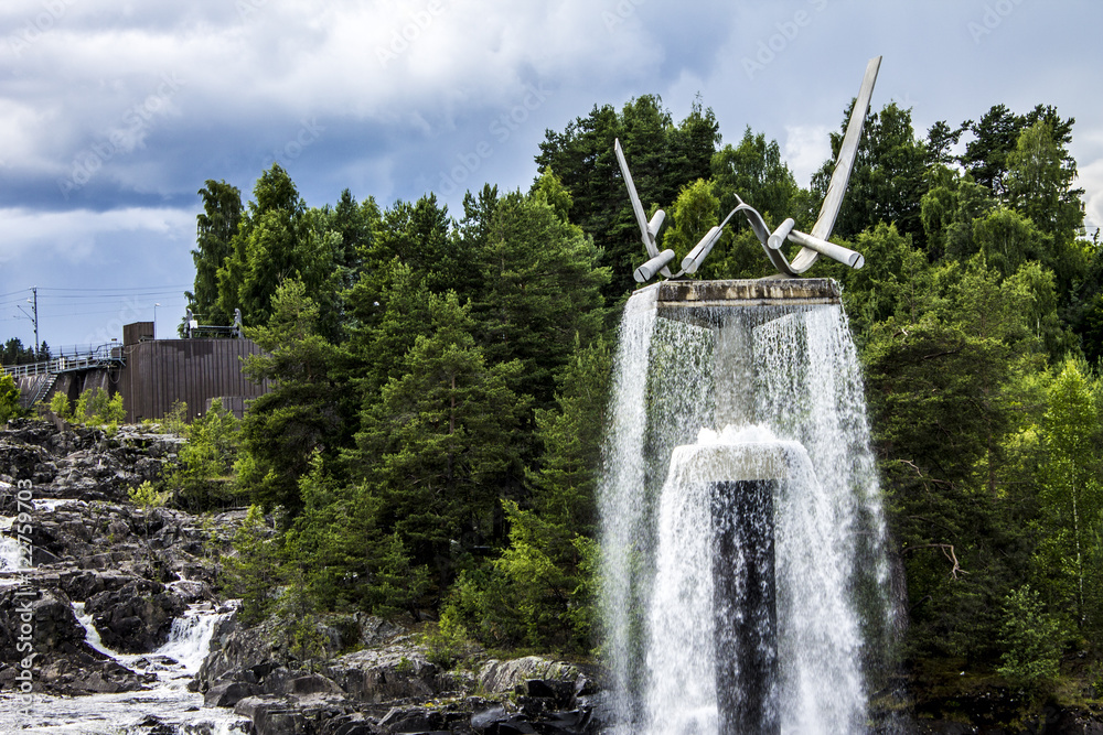 Fototapeta premium Small waterfall Norway city Honefoss 01.07.2014