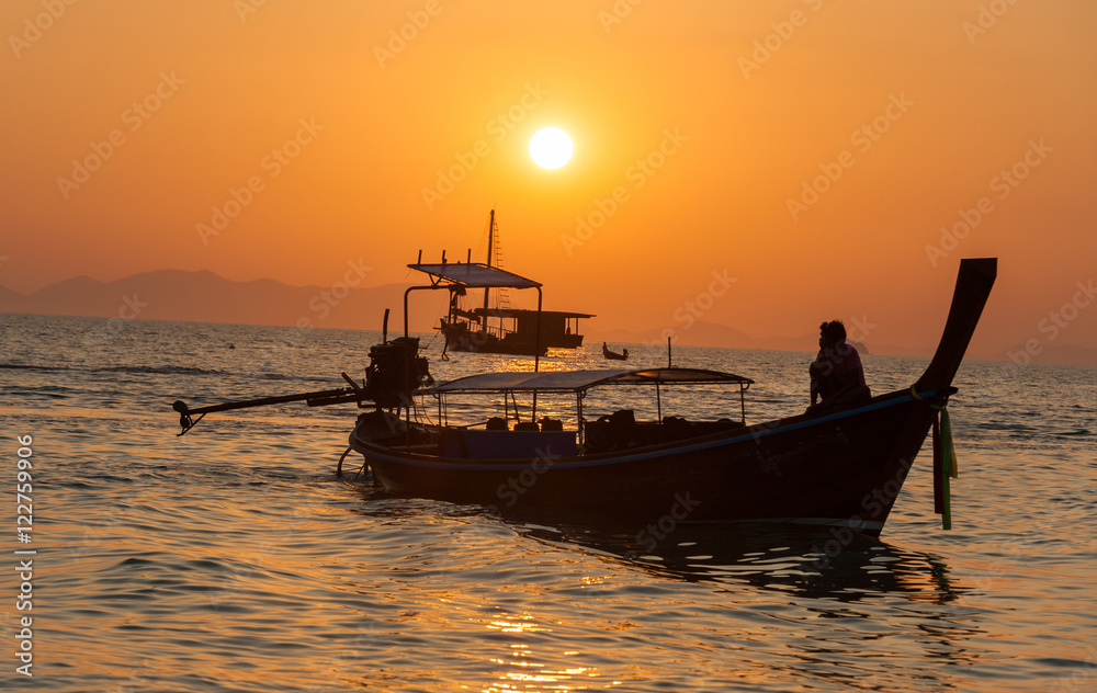 Sunset view wirh boats at pranang beach of Railay Krabi Thailand