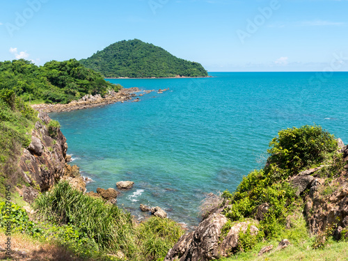 Beautiful seascape with mountain on blue sky. Coastline Scenery in Thailand.