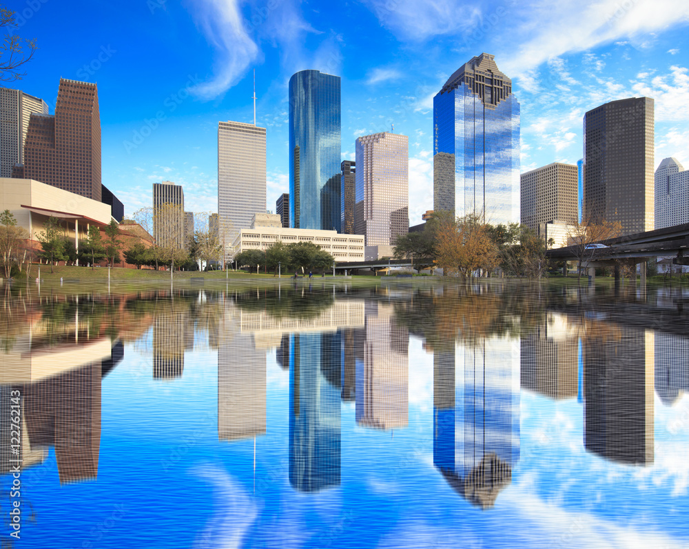 Houston Texas Skyline with modern skyscrapers and blue sky view, water reflection