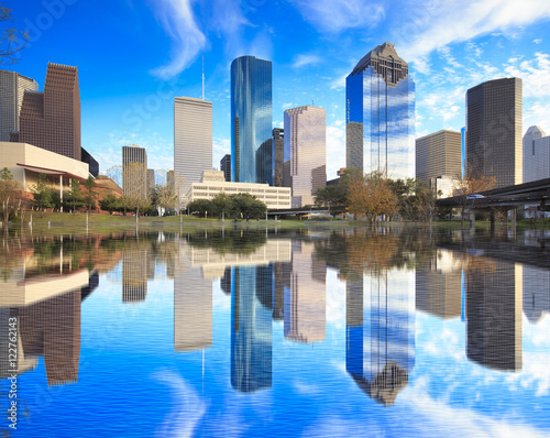 Houston Texas Skyline with modern skyscrapers and blue sky view, water reflection photo