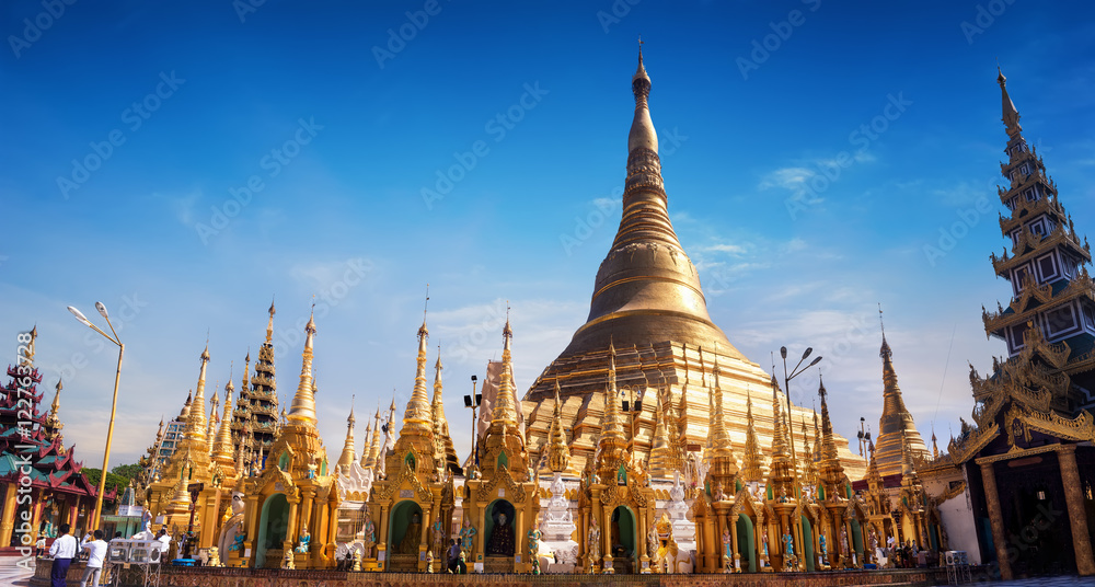 Amazing architecture of Shwedagon or Great Dagon Pagoda. Most sacred Buddhist place with relics of four past Buddhas. Yangon, Myanmar (Burma) travel landscapes and destinations. Ten images panorama