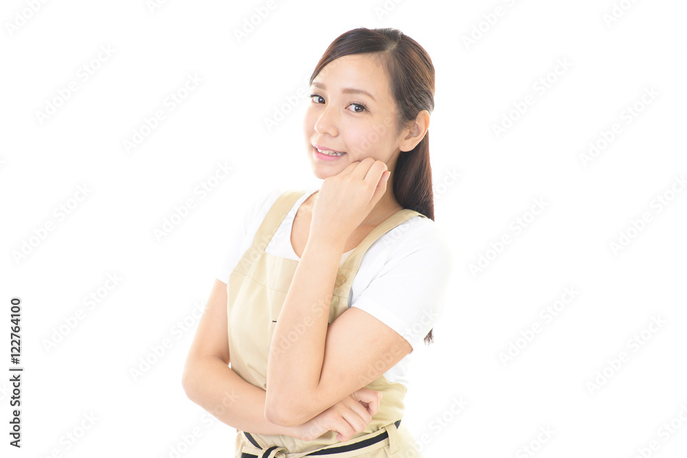 エプロンを着た笑顔の女性 エプロンを着た笑顔の女性