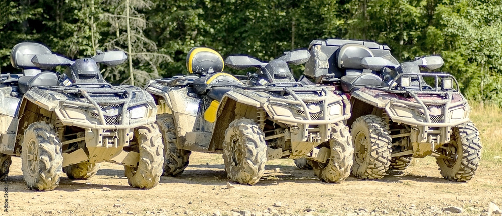 Naklejka premium ATV in mud after riding through the woods.