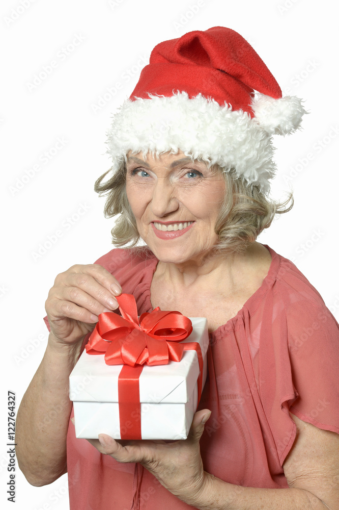 Senior woman in Santa Claus cap