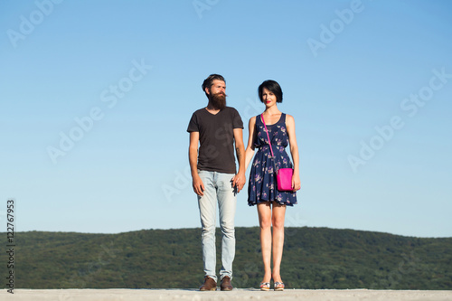 Young couple on mountain scene
