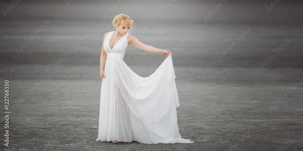 Beautiful bride outdoors in a desert. Beautiful bride outdoors in a desert.
