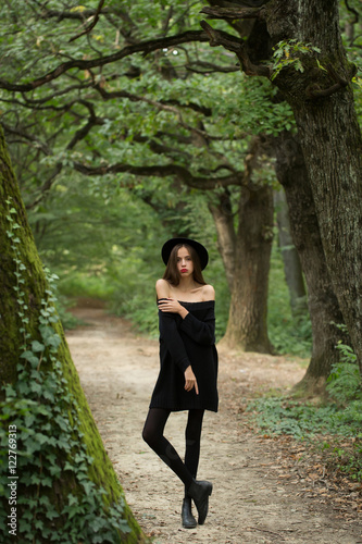 sexy halloween woman in forest © Volodymyr