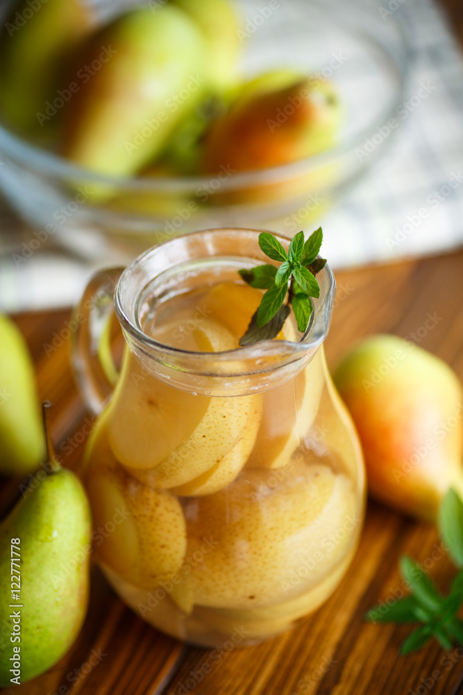 Fototapeta premium sweet pear compote in a decanter