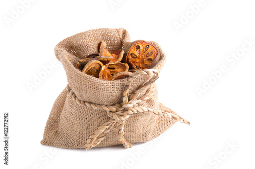 dried quince slices on a white background